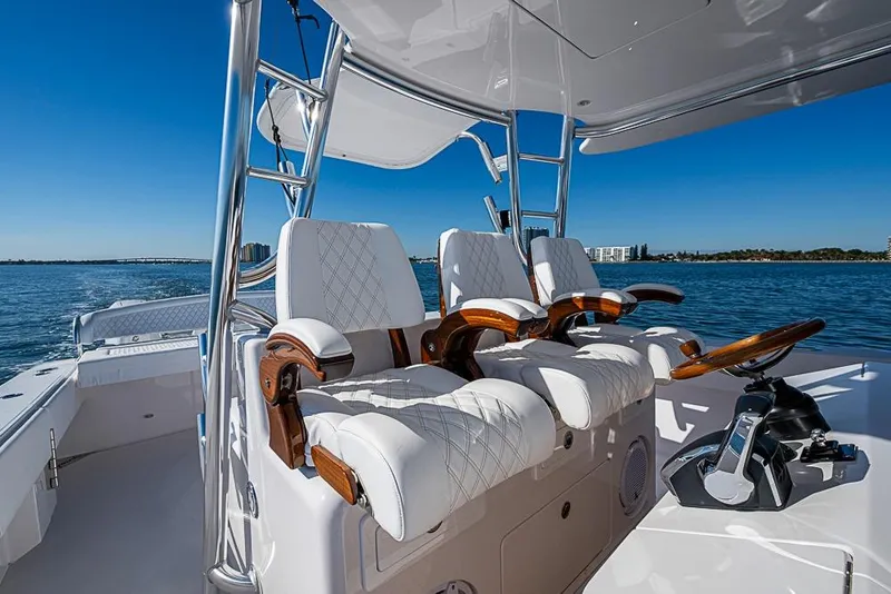 Slide: The Image of Luxurious 2025 Sparks 46 boat interior with plush seating and sleek design on open water. - 125