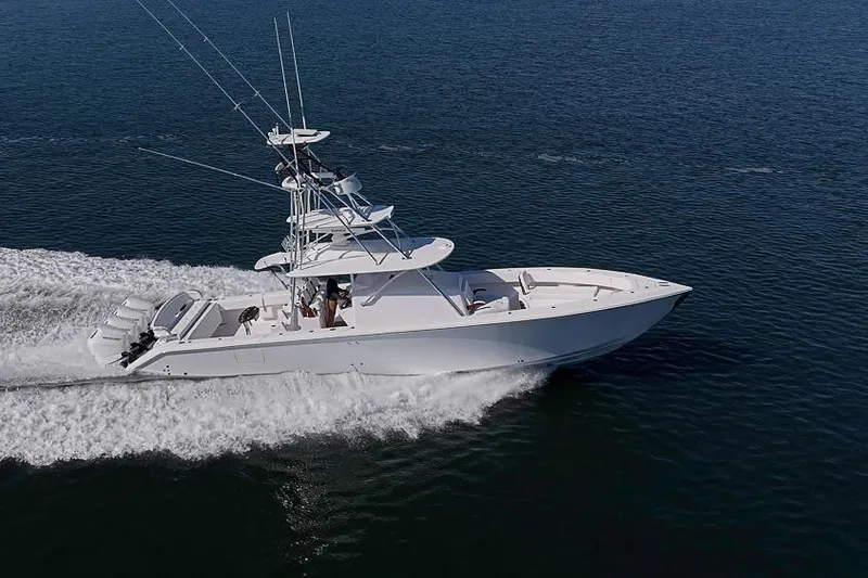 Slide: The Image of Sparks 46 yacht cruising on open water, 2025 model, sleek design, high performance. - 41