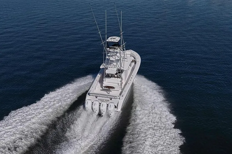 Slide: The Image of Aerial view of 2025 Sparks 46 boat cruising on open water. - 51