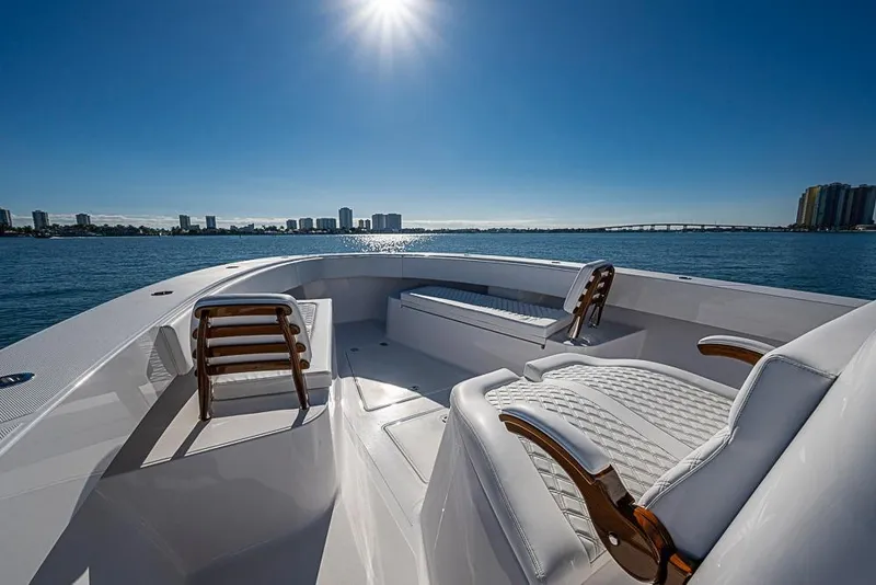 Slide: The Image of Luxurious Sparks 46 boat interior, 2025 model, with elegant seating and ocean view. - 59