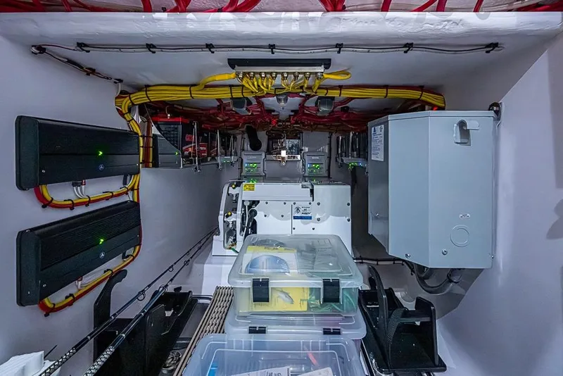 Slide: The Image of Electrical system setup in a Sparks 46, 2025 model, featuring organized wiring and components. - 75