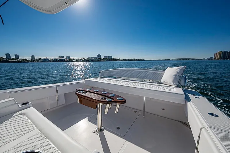 Slide: The Image of Luxury Sparks 46 yacht interior, 2025 model, cruising on a sunny day with city skyline. - 81