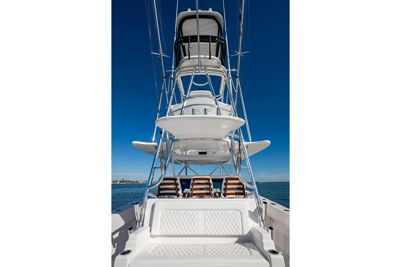 Slide: The Image of Sparks 46 yacht, 2025 model, featuring a sleek tower design against a clear blue sky. - 85