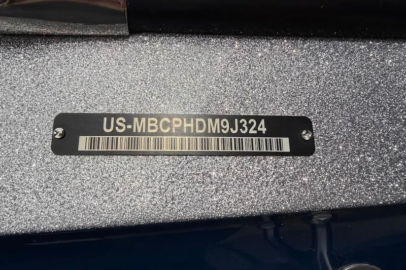Slide: The Image of 2024 MasterCraft X24 boat identification plate with serial number and barcode. - 20
