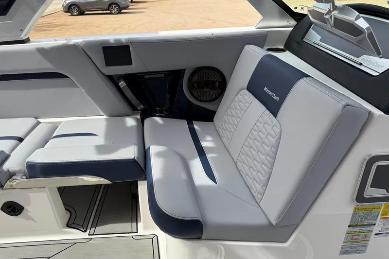 Slide: The Image of 2024 MasterCraft X24 boat interior with stylish seating and modern design. - 7