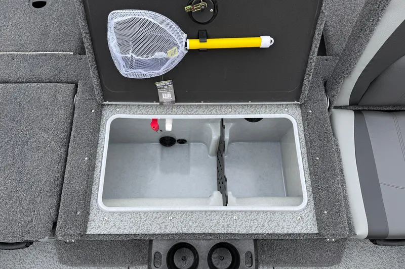 Slide: The Image of 2026 Lund 1875 Impact XS Sport boat livewell with net and storage compartment. - 35