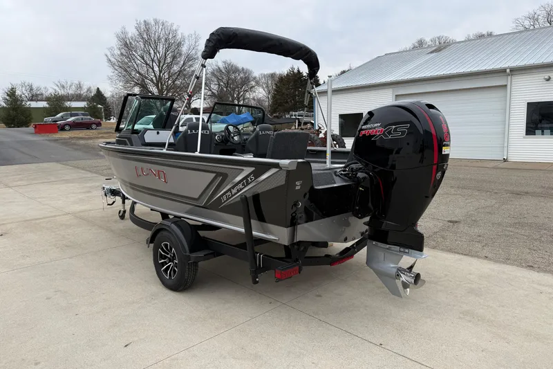 Slide: The Image of 2026 Lund 1875 Impact XS Sport boat with Mercury Pro XS engine on trailer. - 5