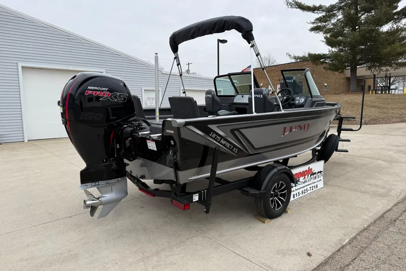 Slide: The Image of 2026 Lund 1875 Impact XS Sport boat with Mercury Pro XS engine on trailer. - 7