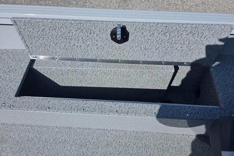 Slide: The Image of Open storage compartment on 2026 Smoker Craft Freedom 160 TL boat. - 20