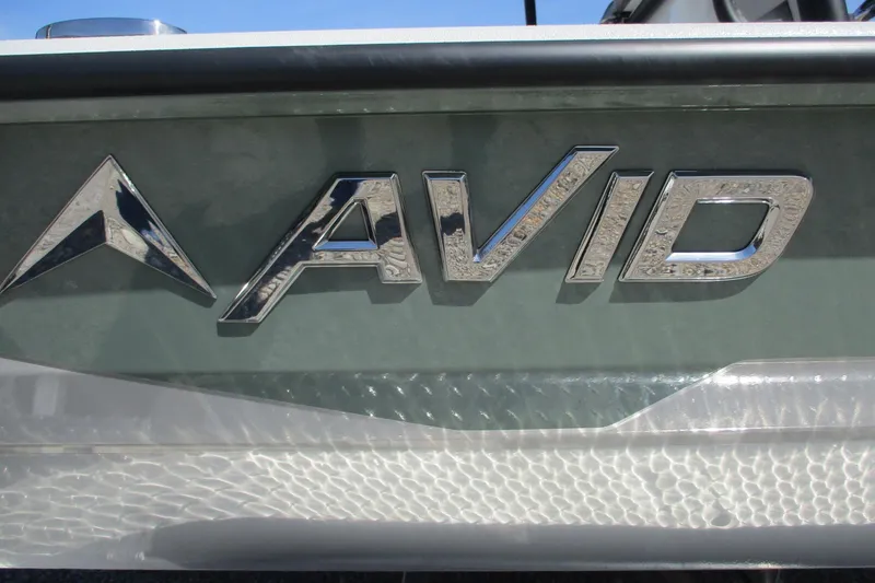 Slide: The Image of Chrome "AVID" logo on 2026 Avid 23 Fusion boat. - 27