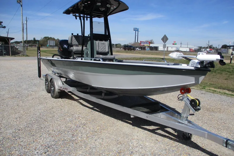Slide: The Image of 2026 Avid 23 Fusion boat on trailer in outdoor setting. - 4