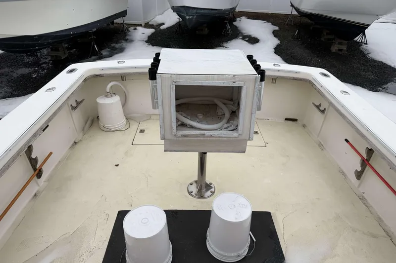 Slide: The Image of 1986 Henriques Yachts 35 Maine Coaster deck with storage and fishing rod holders. - 10