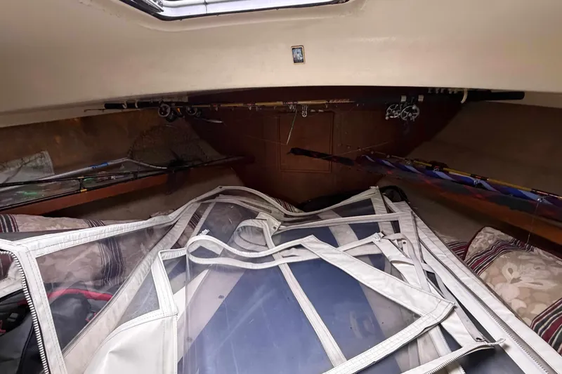 Slide: The Image of Interior cabin of 1986 Henriques Yachts 35 Maine Coaster with fishing gear and storage. - 30