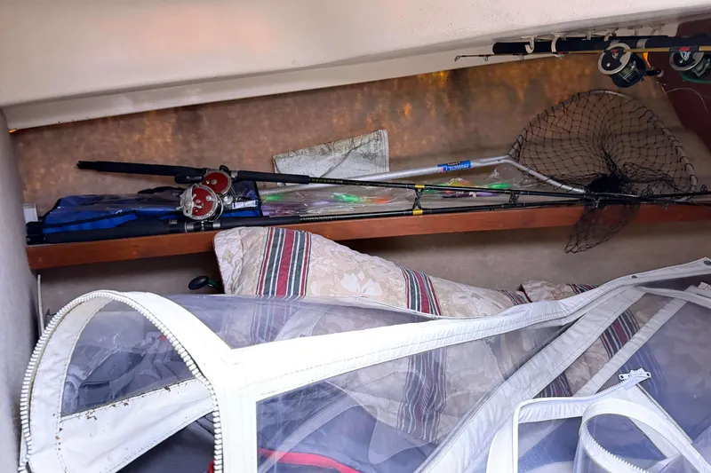 Slide: The Image of 1986 Henriques Yachts 35 Maine Coaster cabin with fishing gear and net storage. - 31