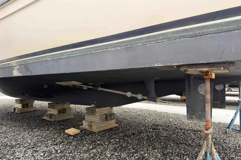 Slide: The Image of 1986 Henriques Yachts 35 Maine Coaster hull on blocks, under maintenance. - 37