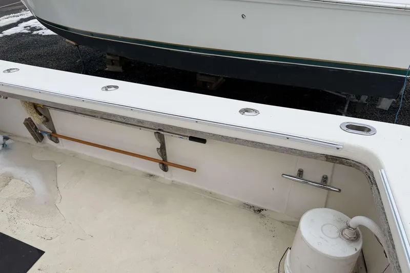 Slide: The Image of 1986 Henriques Yachts 35 Maine Coaster deck with storage and cleaning equipment. - 5