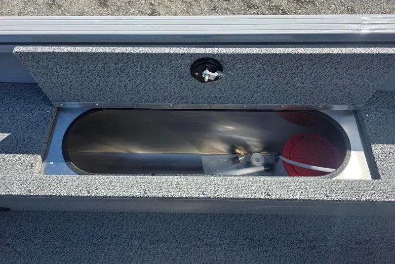 Slide: The Image of Open storage compartment in 2026 Smoker Craft Freedom 160 TL boat. - 17