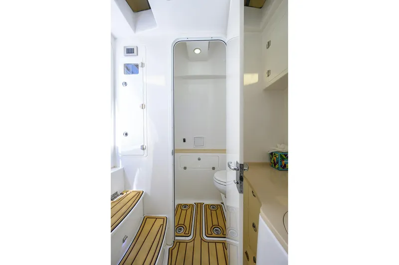 Slide: The Image of 2024 HCB 39 Speciale boat interior with modern bathroom and wooden flooring. - 33