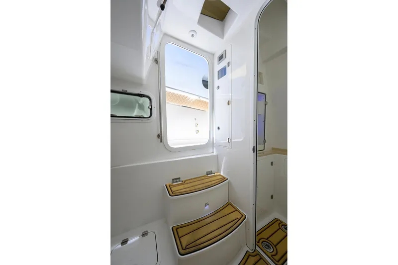 Slide: The Image of Interior of 2024 HCB 39 Speciale boat with wooden steps and window. - 35