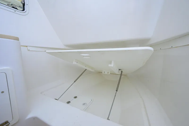 Slide: The Image of 2024 HCB 39 Speciale boat storage compartment with hydraulic lift. - 38