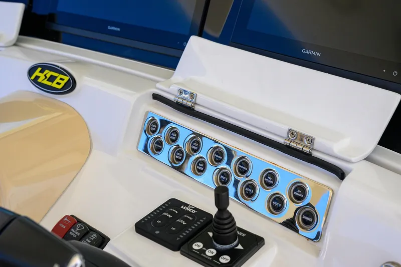 Slide: The Image of Control panel of 2024 HCB 39 Speciale boat with switches and joystick. - 46
