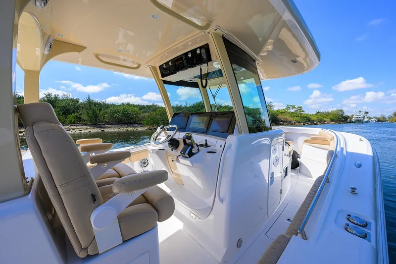 Slide: The Image of 2024 HCB 39 Speciale boat interior with luxurious seating and advanced navigation system. - 47
