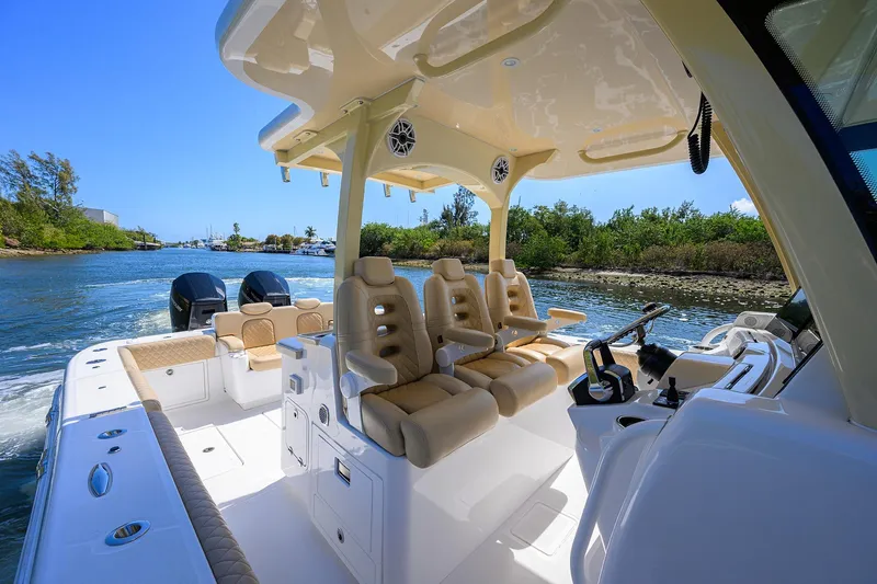 Slide: The Image of 2024 HCB 39 Speciale luxury boat interior with plush seating and dual engines. - 49