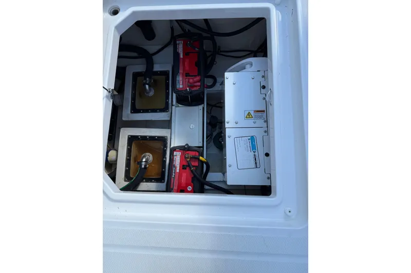 Slide: The Image of 2024 HCB 39 Speciale boat engine compartment with batteries and wiring. - 9