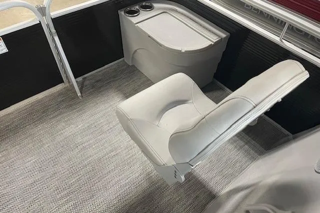 Slide: The Image of 2024 Bennington 18SFV Fishing Barge interior with seating and storage area. - 6