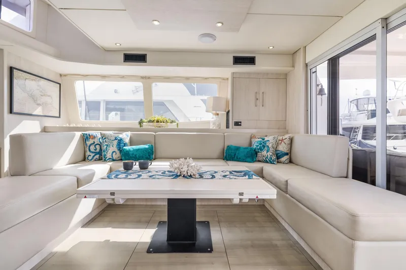Slide: The Image of Luxurious interior of 2015 Leopard 58 yacht with elegant seating and decorative pillows. - 28