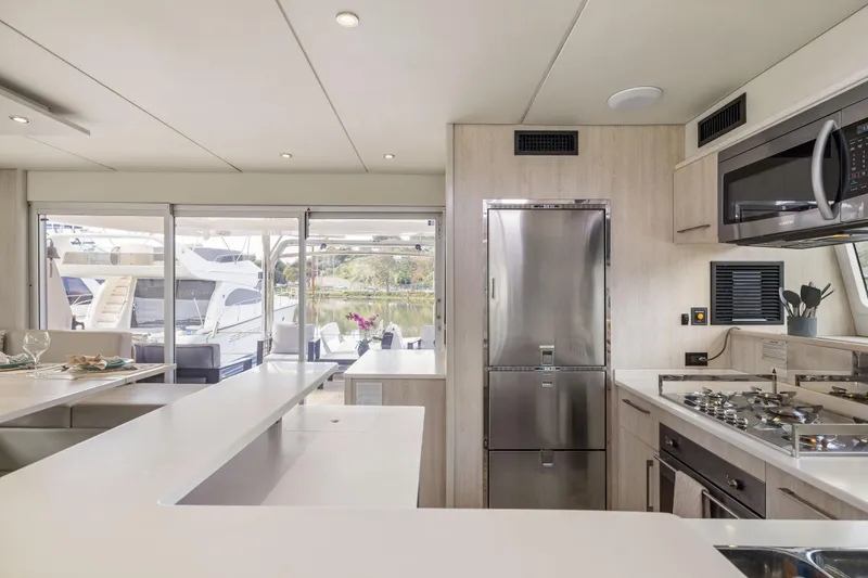 Slide: The Image of Luxurious kitchen interior of 2015 Leopard 58 yacht with modern appliances and sleek design. - 32