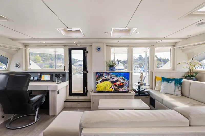 Slide: The Image of Luxurious interior of 2015 Leopard 58 yacht with modern decor and panoramic windows. - 34