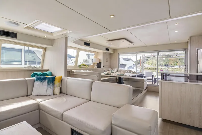 Slide: The Image of Luxurious interior of 2015 Leopard 58 yacht with modern seating and dining area. - 36