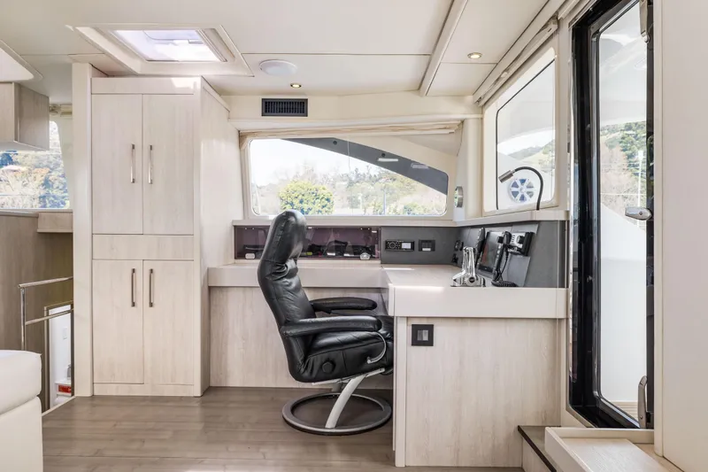 Slide: The Image of Luxurious Leopard 58 yacht interior with modern helm station and comfortable seating, 2015 model. - 37