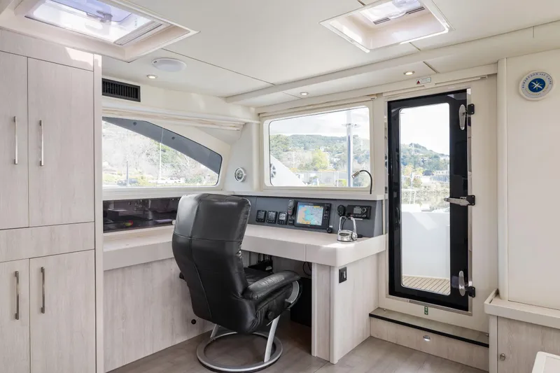 Slide: The Image of Luxurious 2015 Leopard 58 yacht interior with navigation station and modern design. - 38