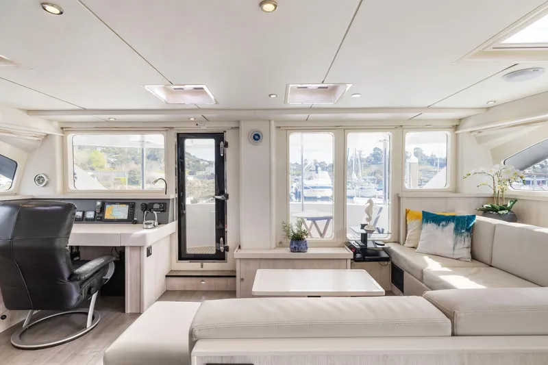 Slide: The Image of Luxurious interior of a 2015 Leopard 58 yacht with modern furnishings and panoramic windows. - 39