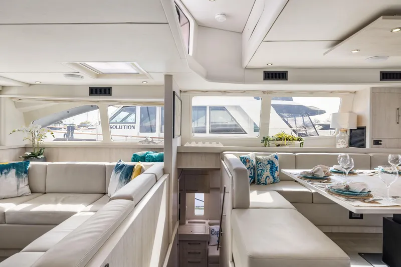 Slide: The Image of Luxurious interior of a 2015 Leopard 58 yacht with elegant seating and dining area. - 41