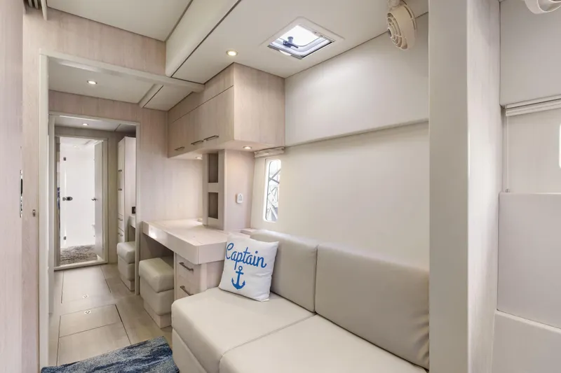 Slide: The Image of Interior of 2015 Leopard 58 yacht with modern decor and "Captain" pillow. - 45