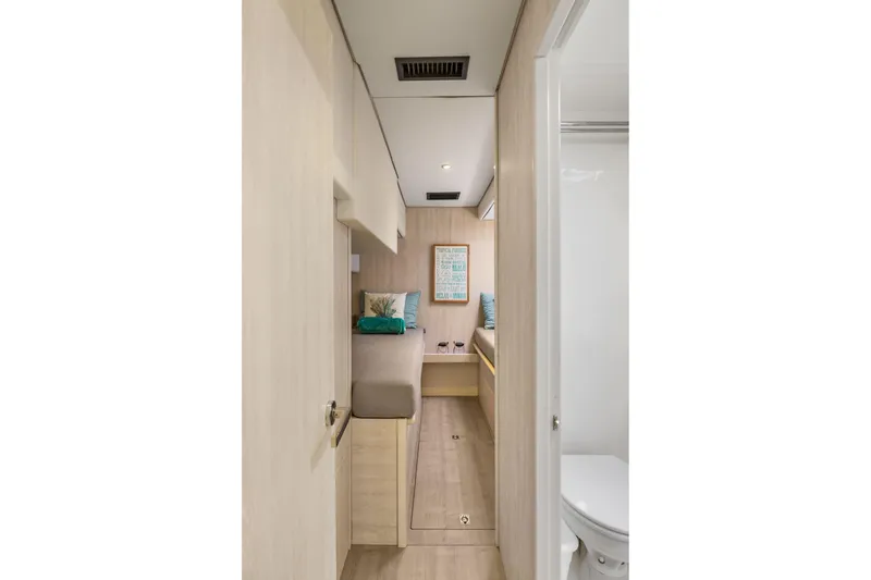 Slide: The Image of Interior of 2015 Leopard 58 yacht with cozy cabin and modern bathroom. - 58