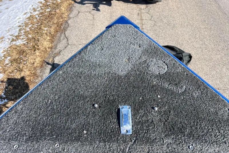 Slide: The Image of Bow of 2020 Lund 1675 Adventure Sport boat on a paved surface. - 13