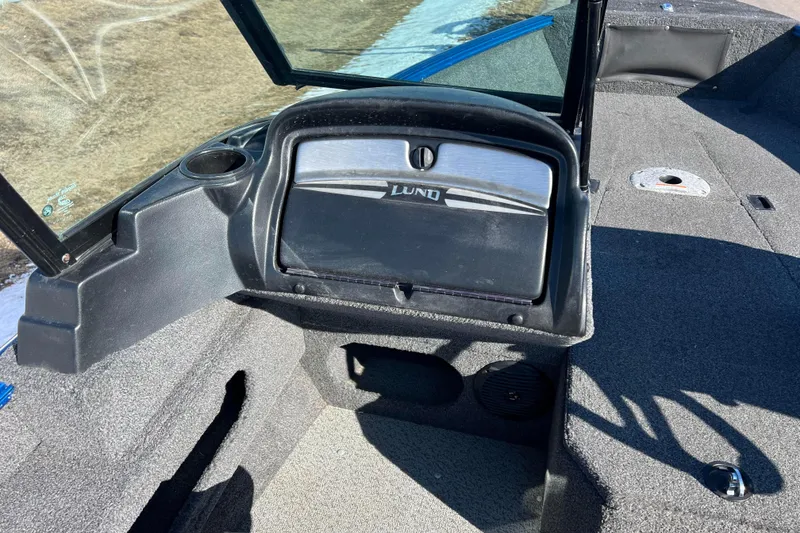 Slide: The Image of 2020 Lund 1675 Adventure Sport boat interior with open storage compartment. - 20