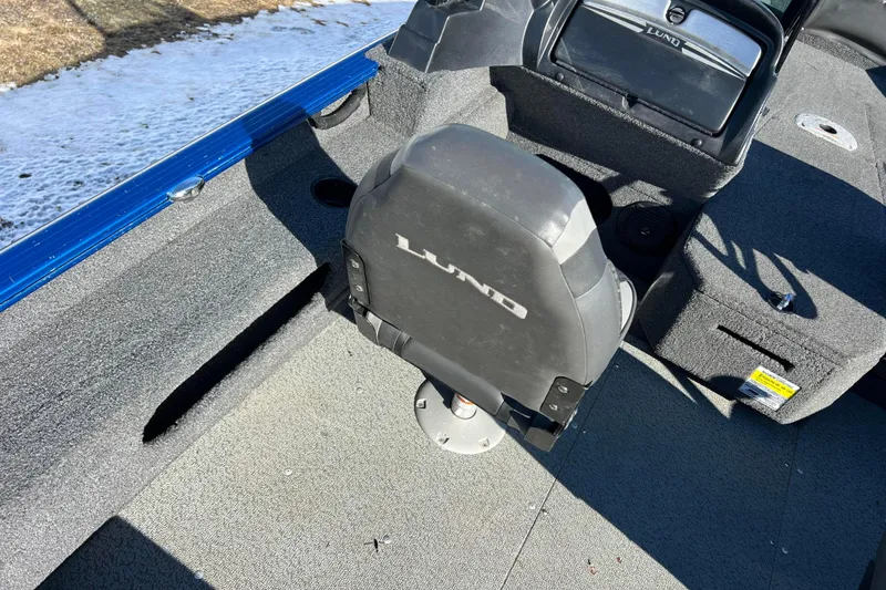 Slide: The Image of 2020 Lund 1675 Adventure Sport boat interior with seating and dashboard. - 30