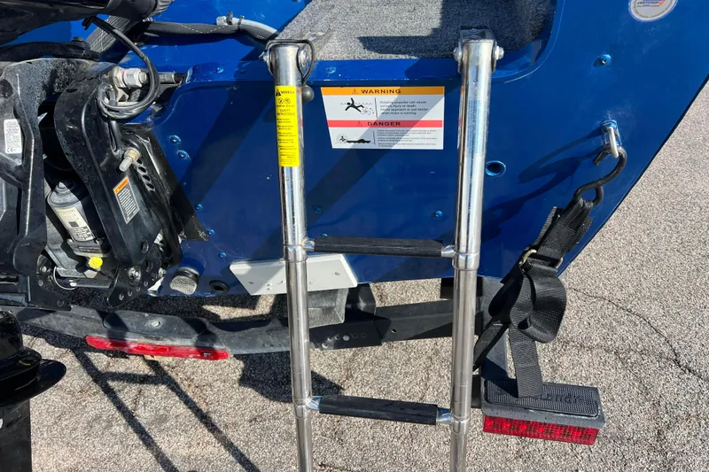 Slide: The Image of 2020 Lund 1675 Adventure Sport boat ladder and motor detail. - 32