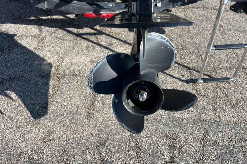 Slide: The Image of Propeller of 2020 Lund 1675 Adventure Sport boat on pavement background. - 35