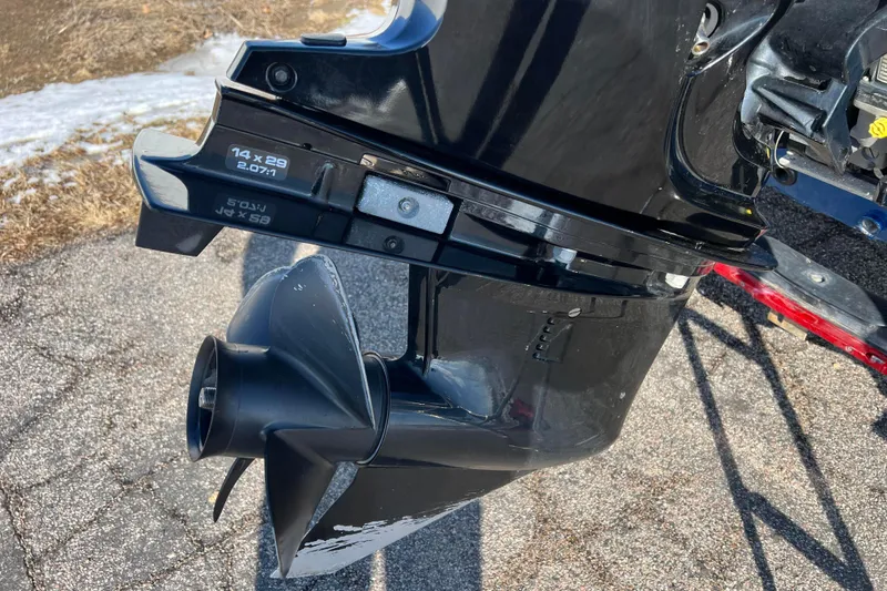 Slide: The Image of 2020 Lund 1675 Adventure Sport boat motor propeller on pavement. - 37