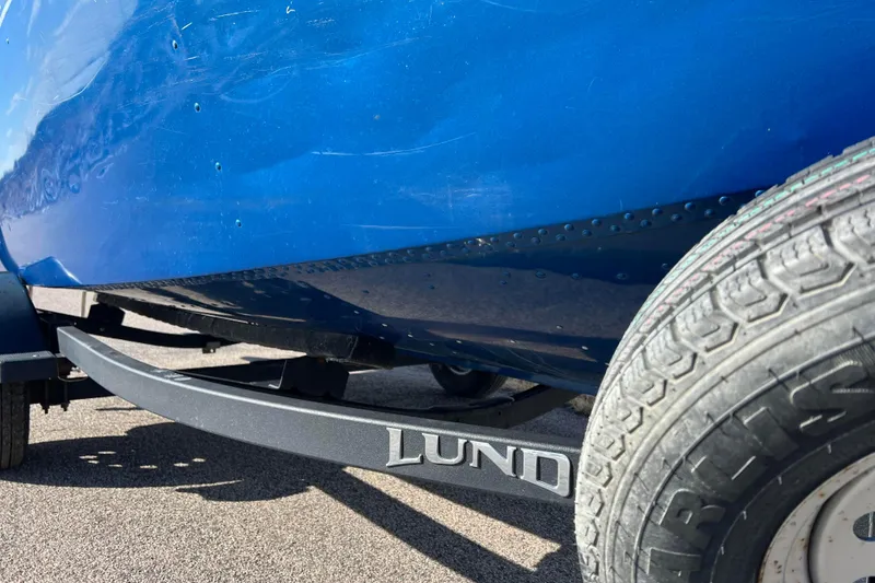 Slide: The Image of Blue 2020 Lund 1675 Adventure Sport boat on trailer, close-up view. - 47