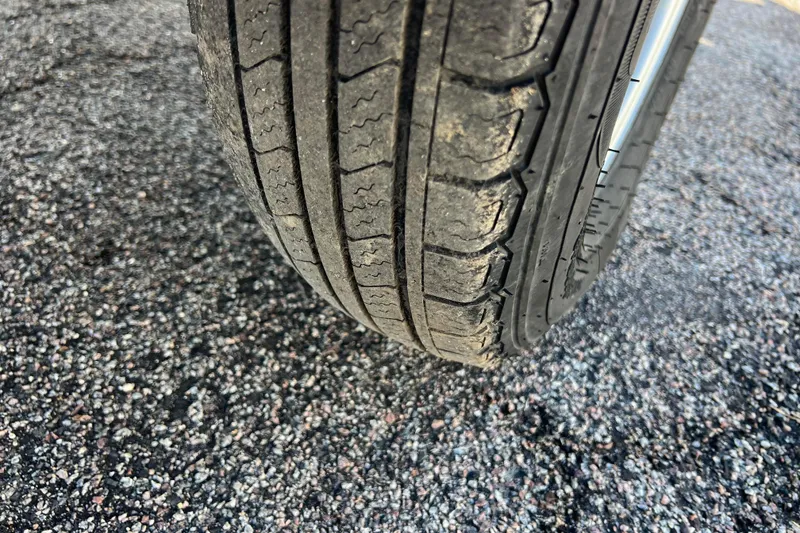 Slide: The Image of Close-up of a worn tire on a 2020 Lund 1675 Adventure Sport. - 60