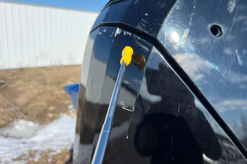 Slide: The Image of Close-up of 2020 Lund 1675 Adventure Sport boat with yellow paint touch-up. - 63