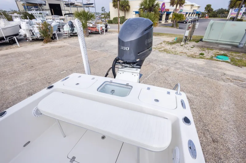 Slide: The Image of 2017 Andros Tarpon 26 boat with Yamaha 300 engine, docked in a marina. - 20