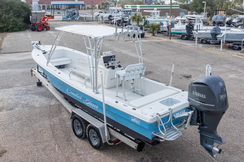 Slide: The Image of 2017 Andros Tarpon 26 boat with Yamaha 300 engine on trailer in marina. - 4